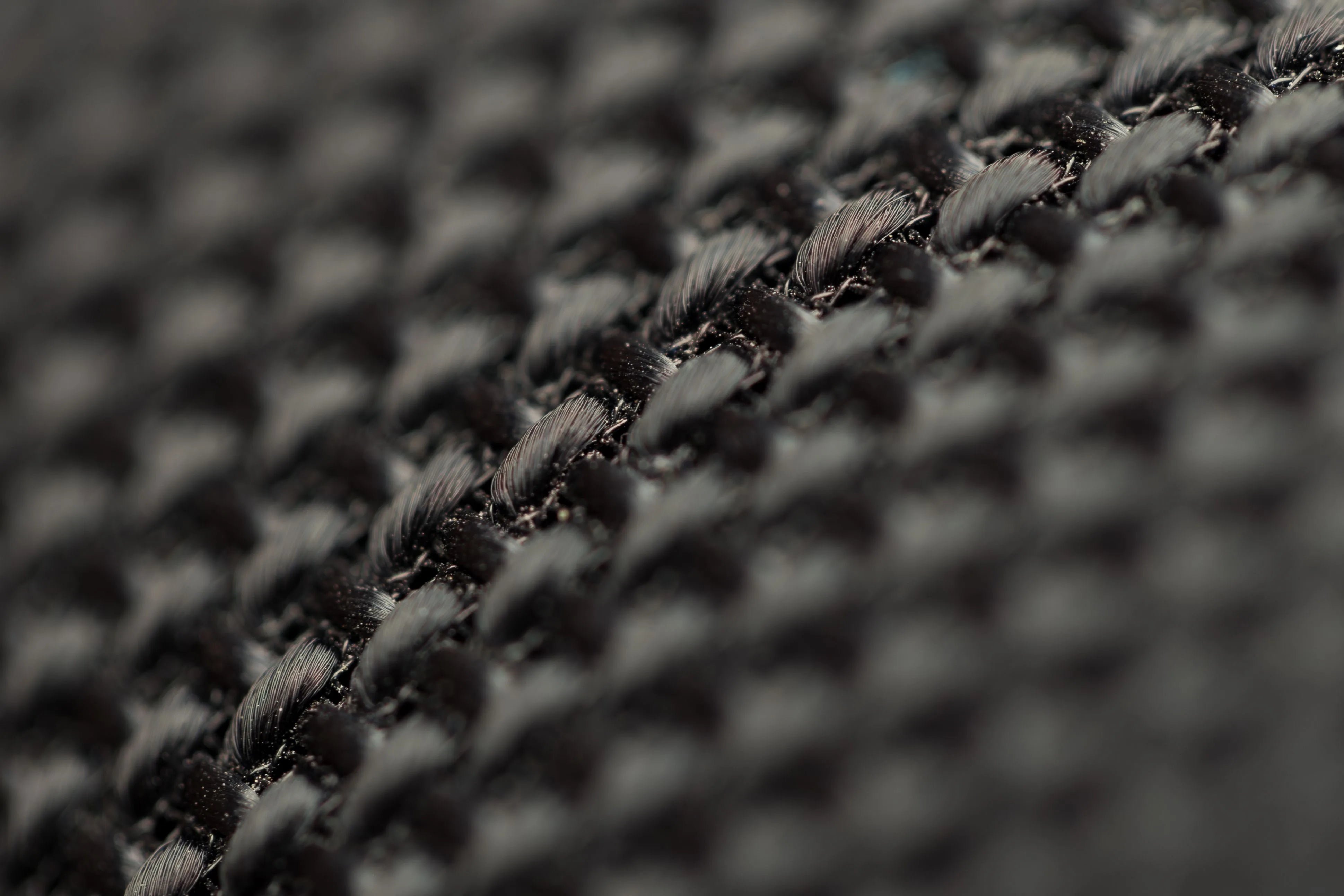 Black woven textile structure for bedding material engineering